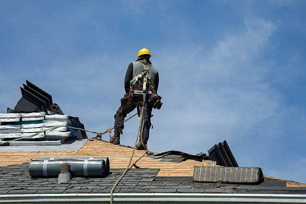 Professional Roof Replacement technician working in Hartville, WY